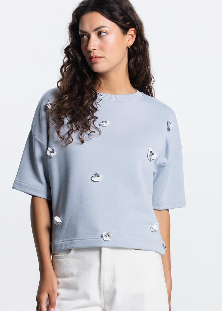 Jansen Amsterdam Noa sweater met bloemdetail in Lichtblauw