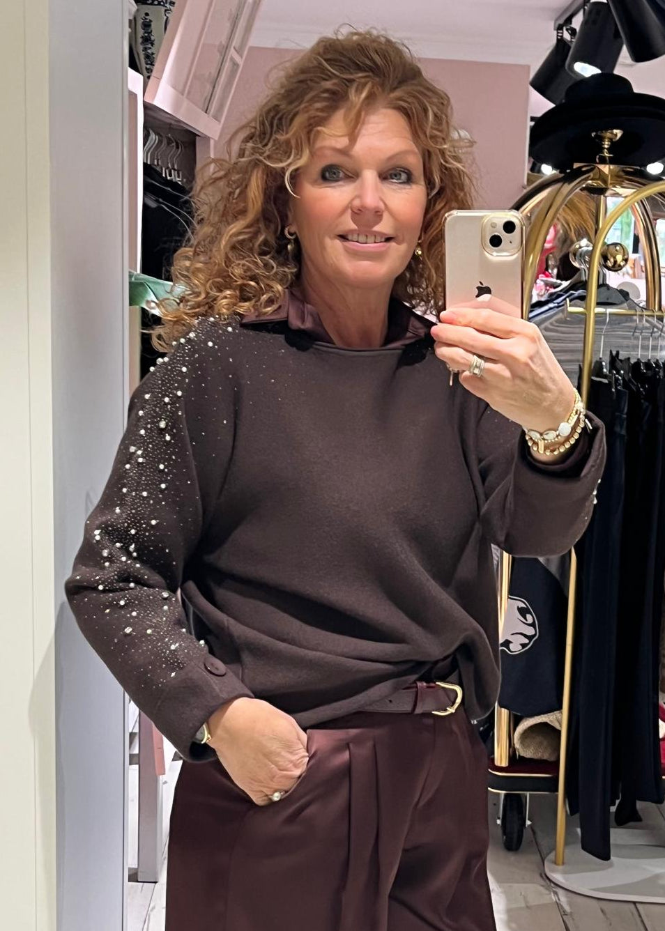 Turquoise pullover chocolade, offwhite en zwart