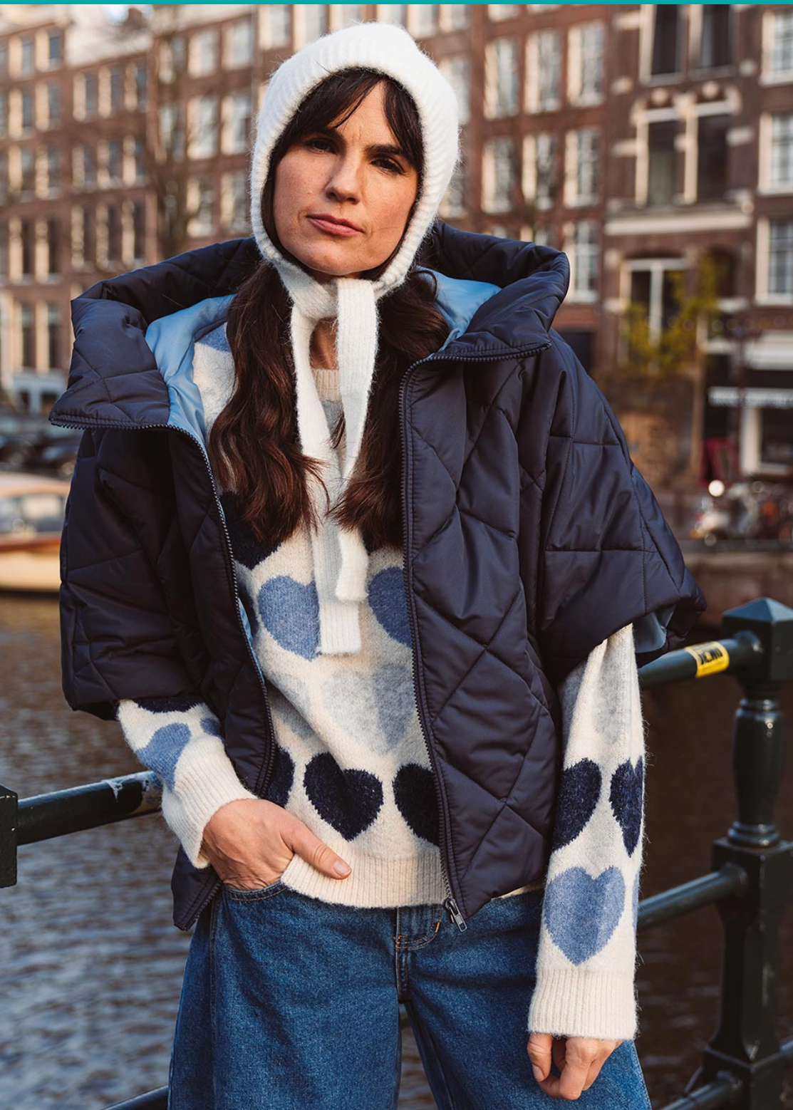 Turquoise bodywarmer marine korte mouw