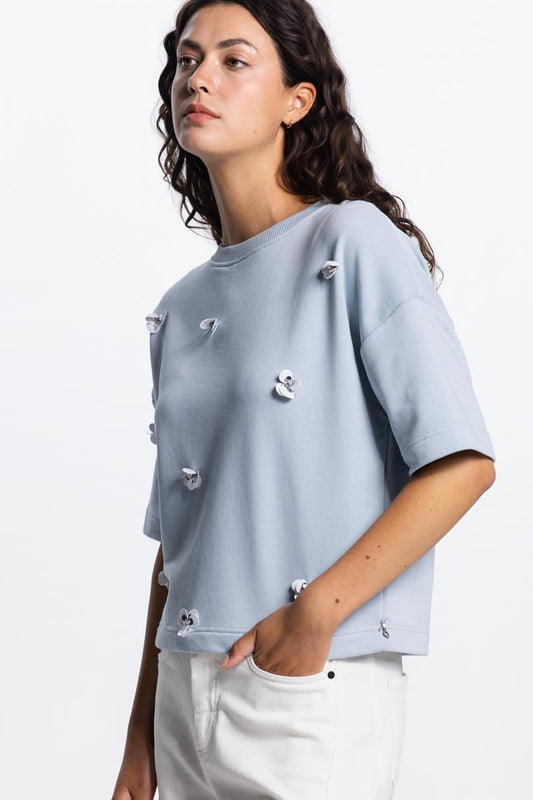 Jansen Amsterdam Noa sweater met bloemdetail in Lichtblauw